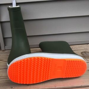 Olive rain boots, orange soles